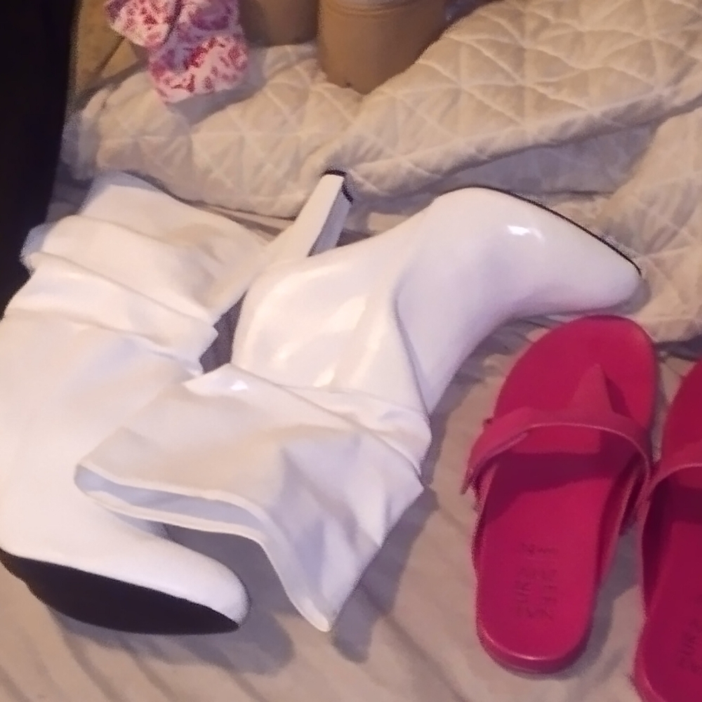 The white boots and red sandals